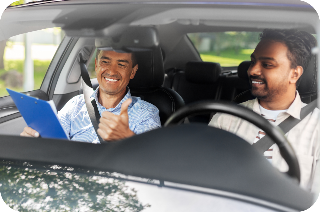 Driving instructor and learner during a lesson